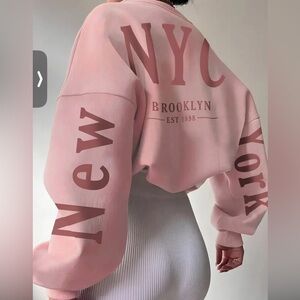 Pink New York Sweatshirt with Red Lettering